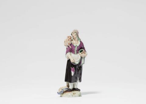A Ludwigsburg model of a beggar woman with a cat