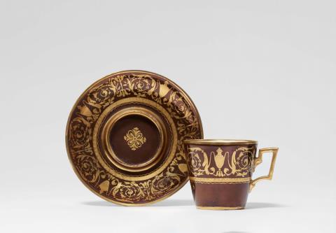 A Royal Vienna porcelain trembleuse cup with arabesque decor