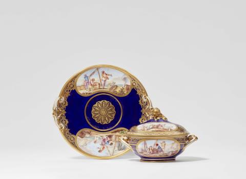 A Sèvres porcelain dish on stand with harbour scenes