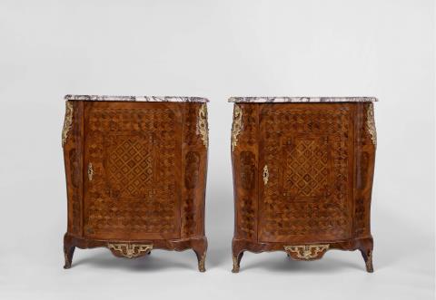 A pair of Parisian corner cabinets with the stamp of Joseph Schmitz