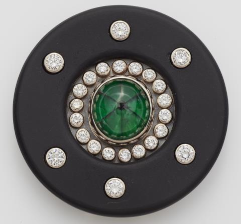 Hans-Leo Peters - A German 18k white gold onyx and diamond brooch with a rare natural Colombian Trapiche emerald.