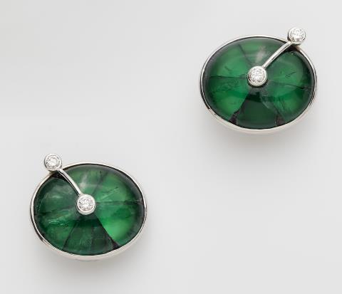 Hans-Leo Peters - A pair of German 18k white gold diamond clips earrings with rare natural Columbian Trapiche emeralds.