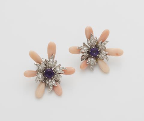 René Kern - A pair of German 18k white gold amethyst and coral earclips.