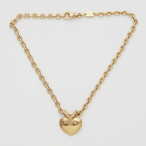 A French 18k gold and diamond link necklace with "Liens croises" heart pendant.
