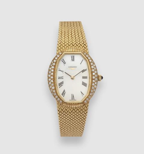 Longines - An 18k gold Longines manually wound ladies wristwatch.