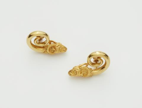 Ilias Lalaouins - A pair of Greek 18k gold archaeologial revival ram's head clip earrings.