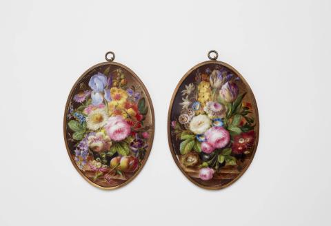 A pair of oval porcelain plaques with floral still lifes