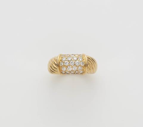  Van Cleef & Arpels - A French 18k gold and diamond "Philippine" band ring.