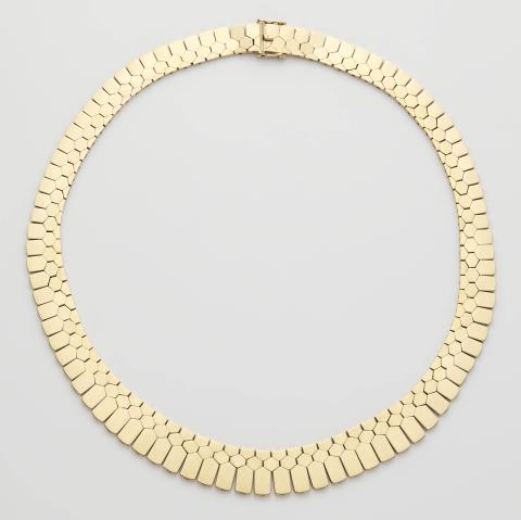 A German 14k gold honeycomb necklace.