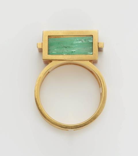 A German 18k gold and emerald prism gentleman's ring.