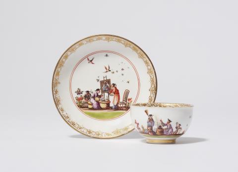 Christian Friedrich Herold - A Meissen porcelain tea bowl and saucer with Chinoiserie decor