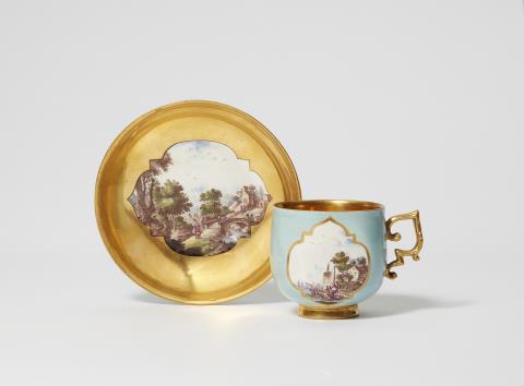 Christian Friedrich Herold - A Meissen porcelain cup and saucer with landscapes