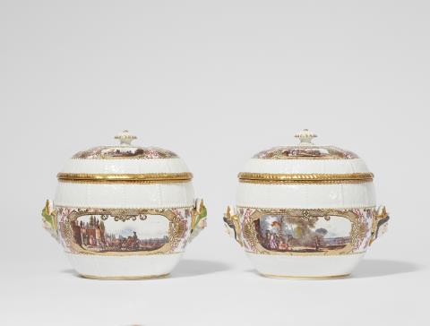 A pair of Meissen porcelain tureens with finely painted landscapes