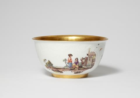 A Meissen porcelain slop bowl with Teniers style scenes