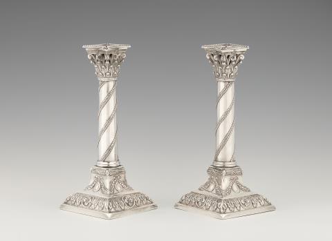 A pair of Louis XVI Minden silver candlesticks