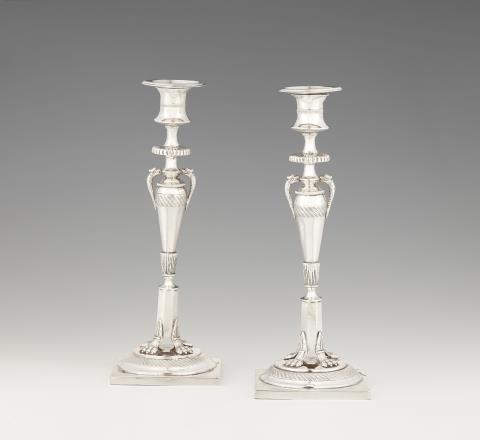 Johann George Wilhelm Heinicke - A pair of Neoclassical Berlin silver candlesticks