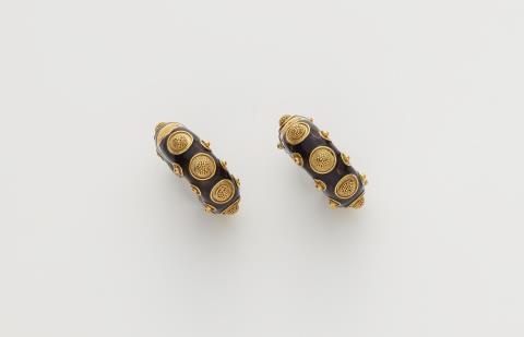 Otto Jakob - A pair of German 18k gold black enamel and granulation hoop earrings.