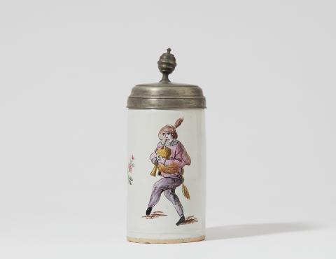  Proskau - A pewter mounted Prószków faience jug with a musician (bagpipes)