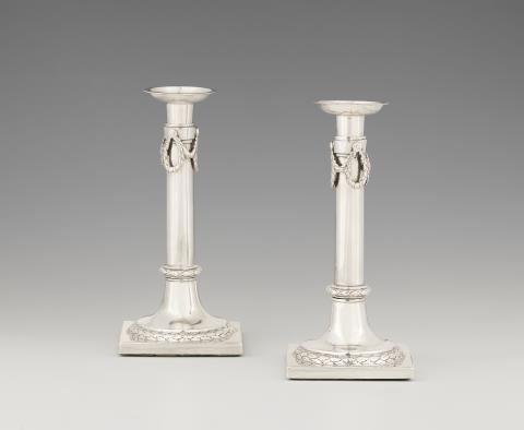 Johan Alhard Jaster - A pair of Brunswick silver candlesticks