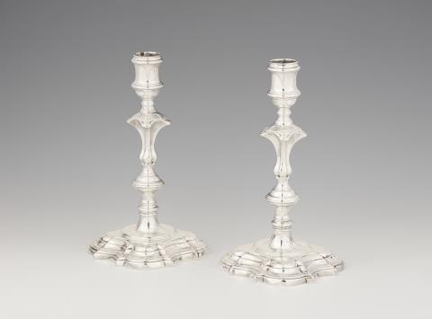 William Williams I - A pair of George II silver candlesticks