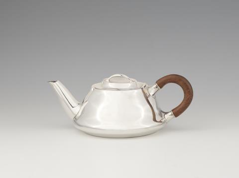An Arts and Crafts silver teapot