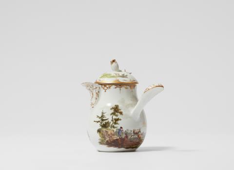  Fürstenberg - A Fürstenberg porcelain milk jug with pastoral landscapes