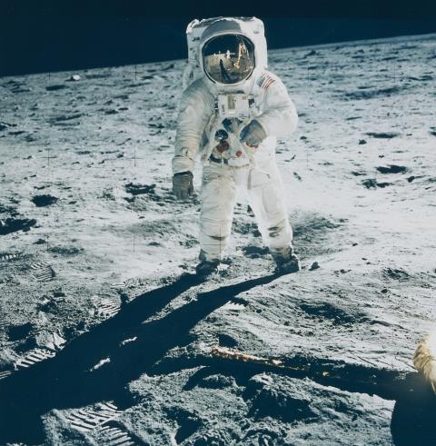 NASA - Astronaut Edwin E. Aldrin Jr. walks on the surface of the moon near the leg of the Lunar Module "Eagle", Apollo 11