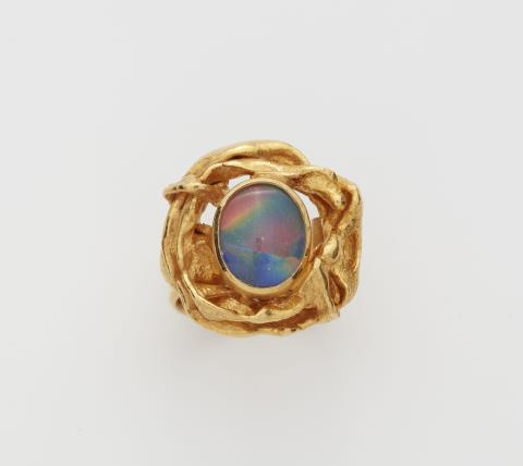 Paul Günther  Hartkopf - A German 18k gold and harlekin opal triplet ring.