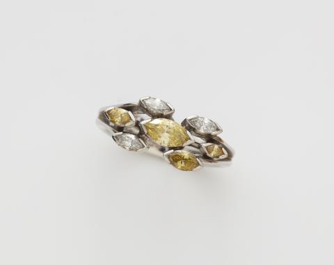 Paul Günther  Hartkopf - A custom made German 18k white gold ring with white and yellow diamonds.