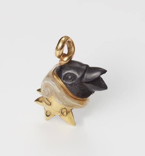 Otto Jakob - A German 18k gold ebony and rock crystal pendant "Raven in Armour". One of a kind.