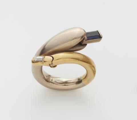 Falko Marx - A German 18k bicolour gold sapphire and diamond snake ring.