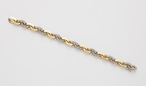  Pomellato - An Italian 18k bicolour gold curb link bracelet.