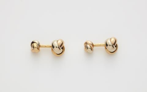 Cartier - A pair of 18k gold Trinity knot cufflinks.