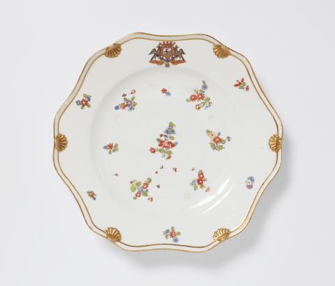 Johann Friedrich Eberlein - A Meissen porcelain plate from the dinner service for Count Heinrich von Podewils