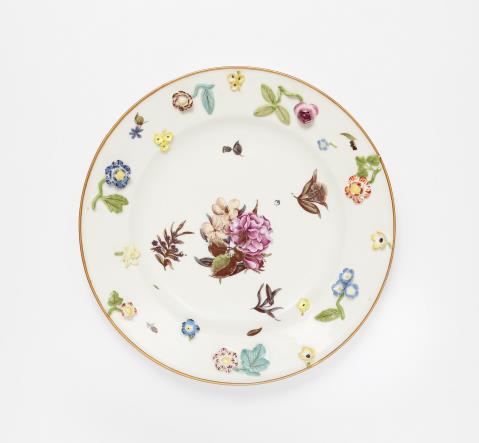 A Meissen porcelain platter with floral relief decor