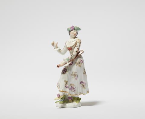 A Meissen porcelain figure of harlequin dancing