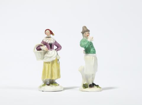 Two miniature Meissen porcelain figures of peasants