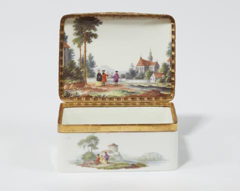 A Meissen porcelain snuff box with landscape decor