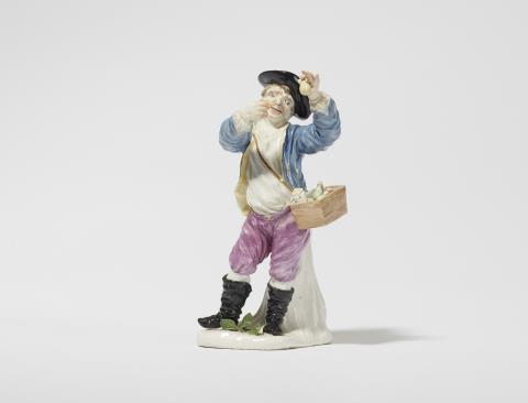 A rare Höchst porcelain figure of a theriac seller