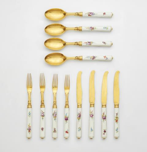 A 12 piece set of dessert cutlery with Meissen porcelain handles