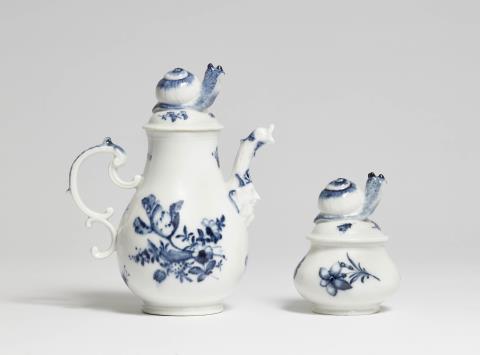 A Meissen porcelain coffee pot and sugar box with snail finials