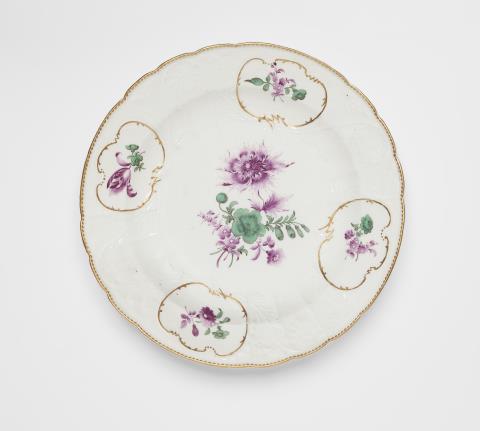 A Meissen porcelain dish with purple and green floral decor