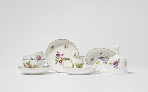 Seven Meissen porcelain items with floral decor