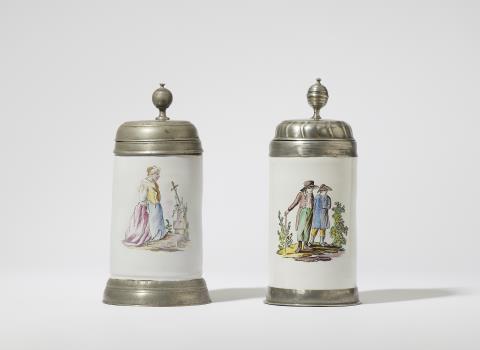  Proskau - Two pewter-mounted Proskau faience tankards with figural decor