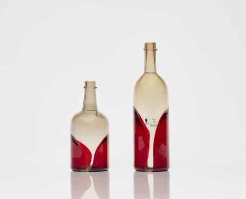  Venini & C. Murano - Two 'Pavoni' bottles
Venini & C., Murano, designed by Tapio Wirkkala, produced in 1982.