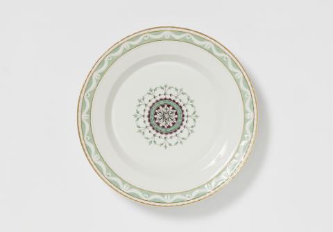 Königliche Porzellanmanufaktur Berlin KPM - A Berlin KPM porcelain dinner plate from a service with a Neoclassical medallion motif