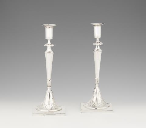 Johann George II Fournier - A pair of Neoclassical Berlin silver candlesticks