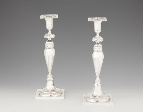 Johann George Wilhelm Heinicke - A pair of Biedermeier silver candlesticks
