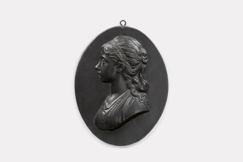  Königliche Eisengießerei Berlin - An oval cast iron plaque with a portrait of a lady