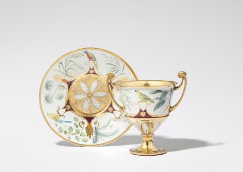  Vienna, Imperial Manufactory directed by Matthias Niedermayer - A Royal Vienna porcelain vase and saucer with parrot motifs